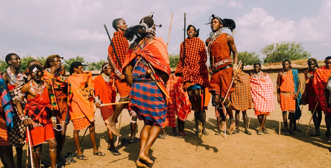 a group of people standing around each other